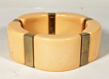 1980s Peach Colored Bakelite Plastic Bracelet With Metal Spacers