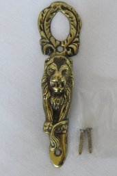 A Petite Size Brass Lion Door Knocker - England