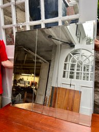 A Three Door Mirrored Medicine Cabinet