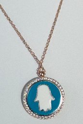 GOLD OVER STERLING SILVER BLUE AND WHITE ENAMELED HAMSA NECKLACE SURROUNDED BY CRYSTALS