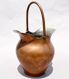 A Copper Double Pouring Pitcher