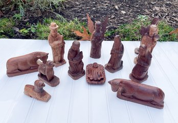 A Hand Carved Wooden Nativity From Laos