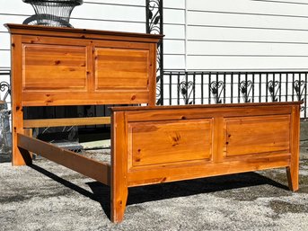 A Vintage Paneled Pine Queen Bedstead By Kincaid Furniture