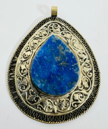 LARGE LOW-GRADE SILVER AND LAPIS PENDANT