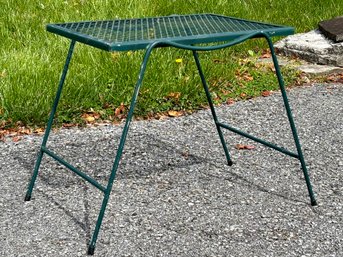 A Mid Century Wrought Iron And Mesh Side Table