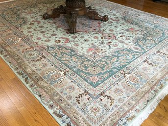 A Hand Knotted And Dyed Indo-Persian Wool Rug