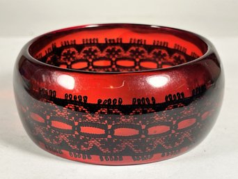 Red Bakelite Wide Bangle Bracelet Having Embedded Lace