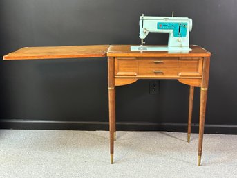 A Fantastic Mid-Century 'Cosmopolitan' Singer Sewing Cabinet With Turquoise Machine