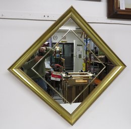 A Diamond Shaped Gilt Framed Wall Mirror