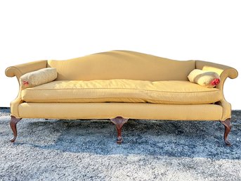 A Vintage Camel Back Sofa With Down Cushion