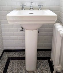 A Vintage Porcelain Pedestal Sink With High-End Fittings, Possibly Waterworks