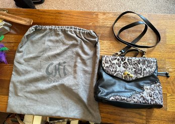 Chi By Falchi Long Sleeve And Hand Carry Bag With Two Zips And One Compartment.