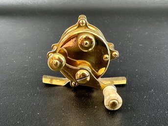 A Vintage Hendryx Fishing Reel In Brass