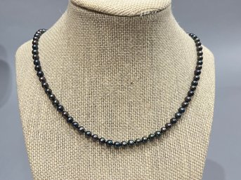 Strand Of Black Pearls With 14K Gold Clasp