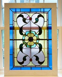 A Framed Antique Stained Glass Window Sash