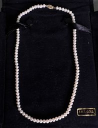 Strand Of White Pearls With 14K Gold Clasp