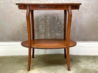 An Antique Carved Wood Occasional Table With Ormolu Trim