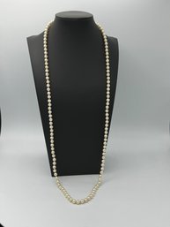 Beautiful Long Strand Of White Pearls With 14k Yellow Gold Clasp