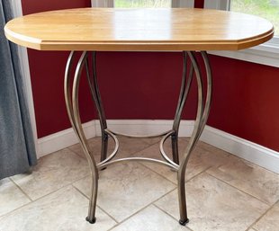 A Butcher Maple Butcher Block Top Highboy Table With Wrought Iron Base