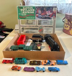 Santas Toy Land Express In Original Box And Some Collection Of Miniature Cars In Different Models And Sizes.