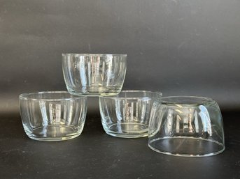 A Set Of Contemporary Bowls In Clear Glass