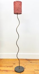 A Contemporary Metal Floor Lamp With Custom Shade