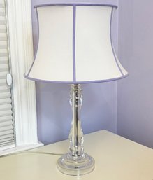 A Glass Table Lamp With Custom Silk Shade