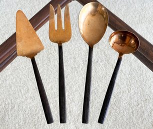 A Set Of Four Vintage Modern Bronze And Brass Serving Utensils