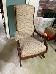 A VICTORIAN SLIPPER FORM ROCKER