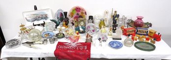 A Tabletop Potpourri Of Collectibles, Figurines, Decorative Items And Useful Things