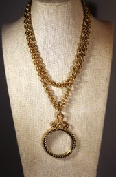 CONTEMPORARY DESIGNER SIGNED MAGNIFTING GLASS NECKLACE GOLD TONE 32' LONG