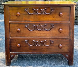 A 19th Century Carved Mahogany Dresser