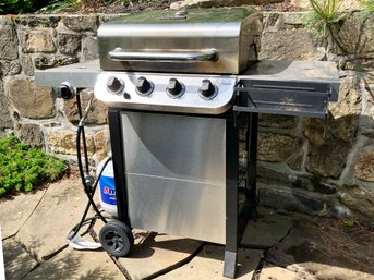 A Charbroil Stainless Steel Propane Grill - Cover Included!