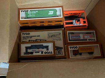 Box Of Various Tyco Brand Train Cars And A Trestle Bridge