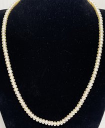 Petite 9 Inch Hand Knotted Pearl Necklace With 14K Clasp In Black Velvet Box