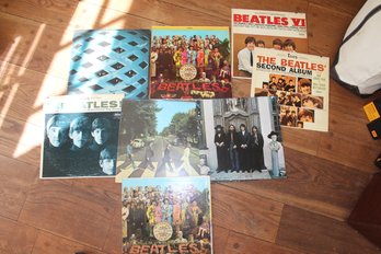 7 Beatles Records And The Who - Tommy