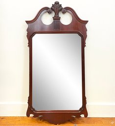 A Vintage Scrolled Wood Mirror In Federal Style