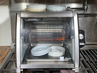 A Ronco Electric Showtime Rotisserie