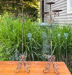 A Pair Of Wrought Iron Candelabra