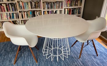 Round Top Table With Two Formed Plastic Chairs