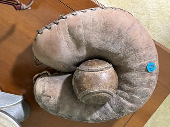 ANTIQUE SOFTBALL MITT AND A SOFTBALL