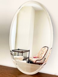 An Oval Beveled Mirror