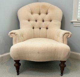 An Armchair In Tufted Linen