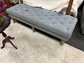 Tufted Gray Bench On Wheels