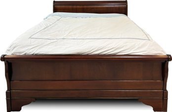 A Solid Cherry Queen Sleigh Bed By Grange Furniture