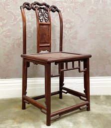 A Vintage Chinese Side Chair With Cane Seat