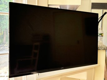 A Sony Vizio Flat Screen TV