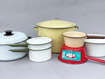 A Large Collection Of Vintage Enamelware