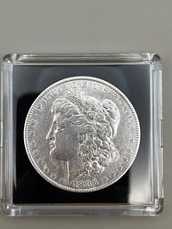 Beautiful 1886 Morgan Silver Dollar In Plastic Case