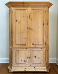 A Large Paneled Pine Cabinet By Lillian August